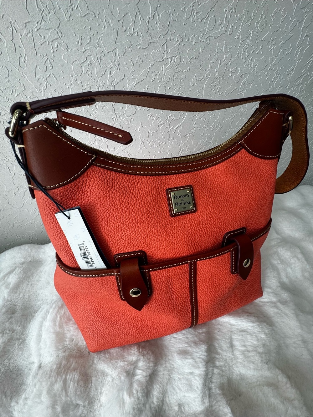 Dooney & Bourke Coral-Orange Pebbled Leather Shoulder Bag with Brown Trim